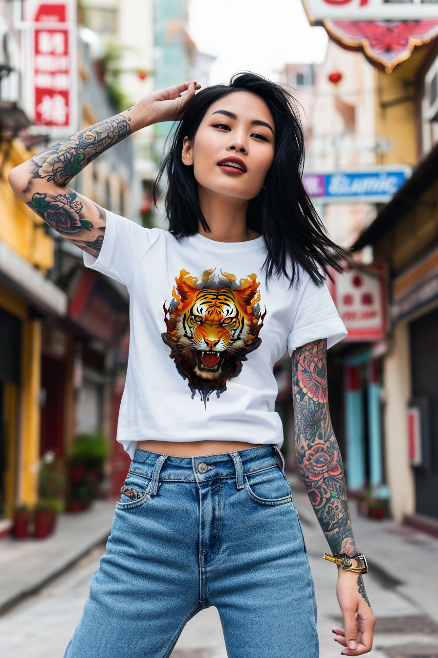 young tattooed woman wearing a white graphic t-shirt featuring a Tiger print