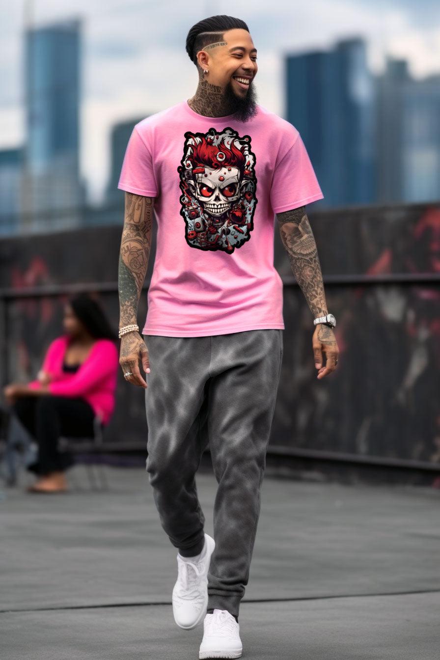 young tattooed man wearing an Azalea-pink graphic t-shirt featuring a skull print
