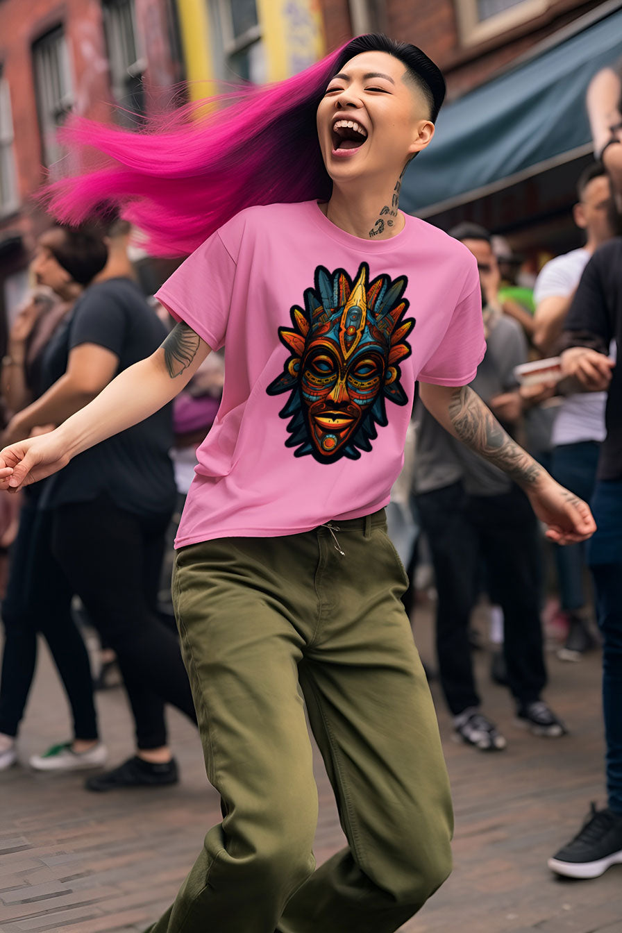 young tattooed woman wearing an Azalea-pink graphic t-shirt featuring a Aztec mask print