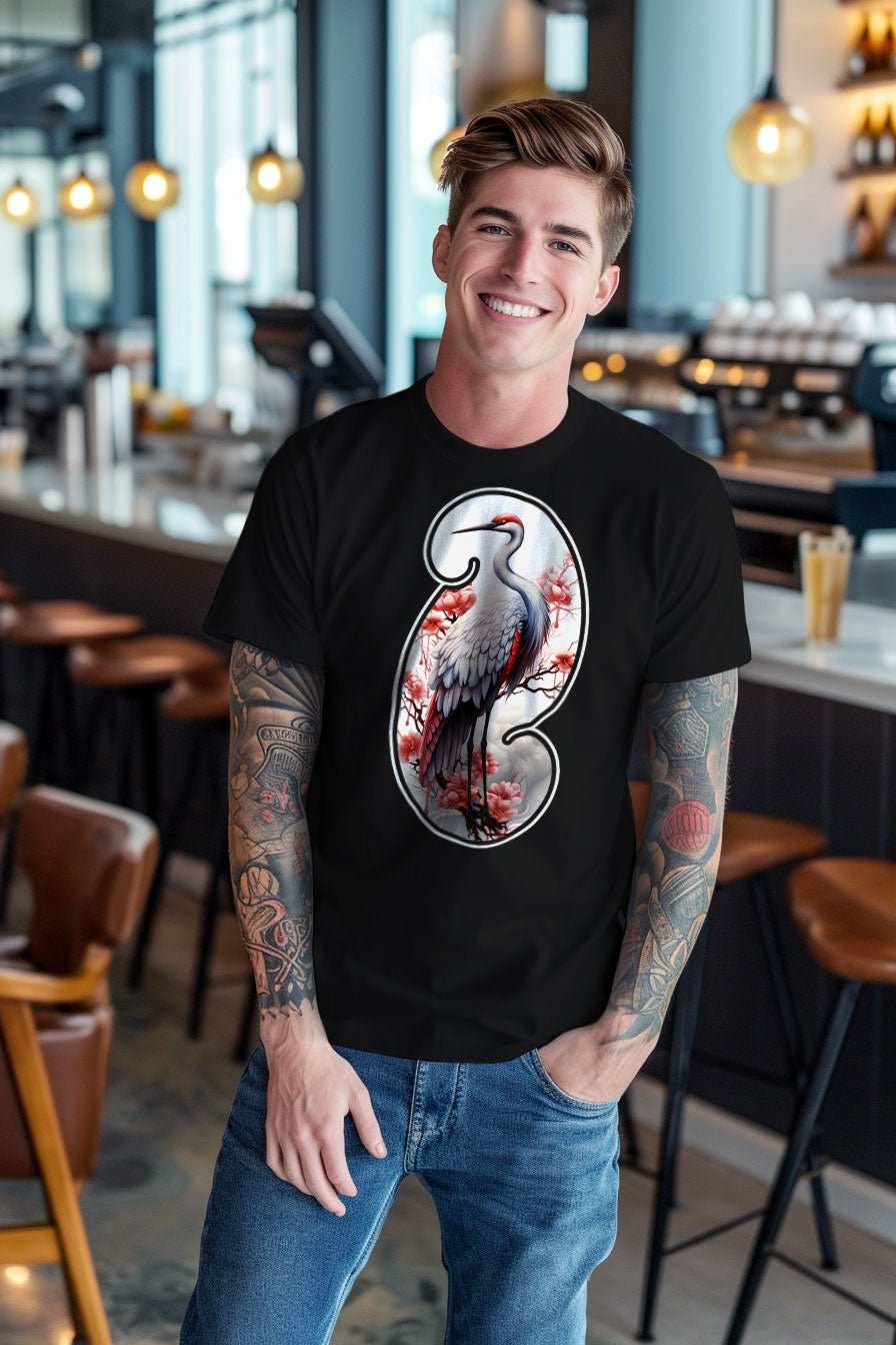 young tattooed man wearing a black graphic t-shirt featuring a Crane print