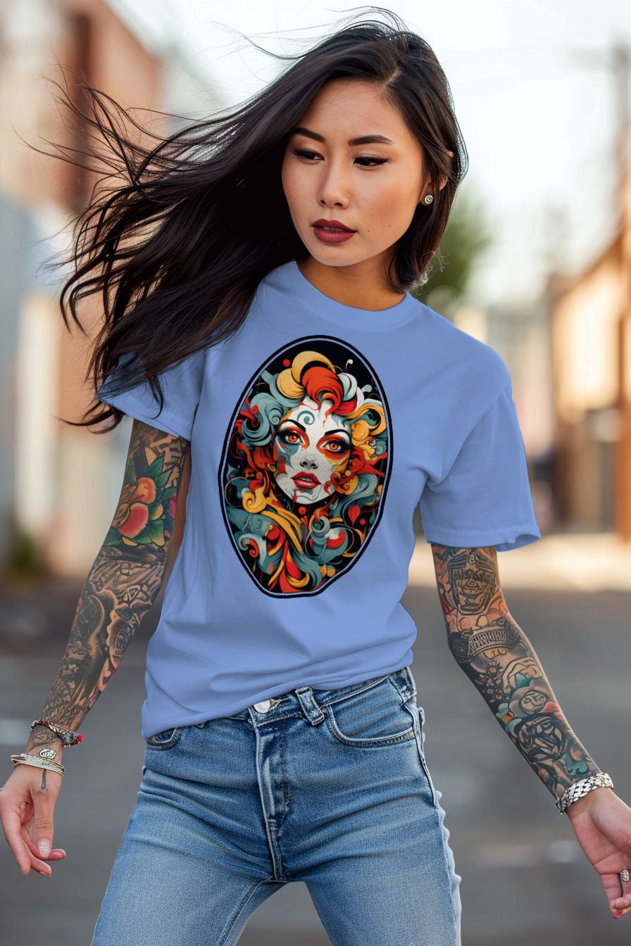 young tattooed woman wearing a light-blue graphic t-shirt featuring a Rococo style woman face with print