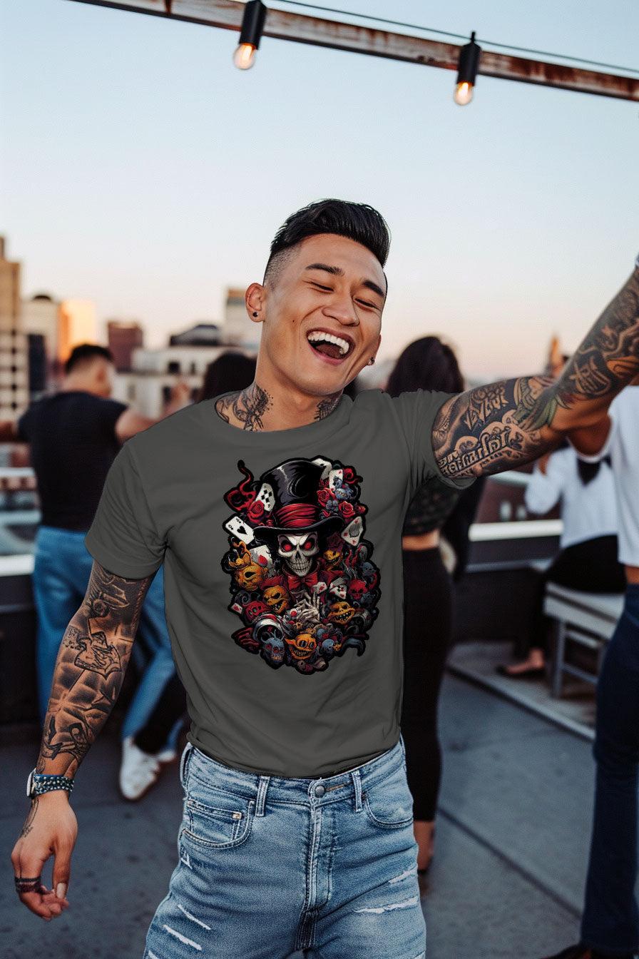 young tattooed man wearing a gray graphic t-shirt featuring a skull with a hat print