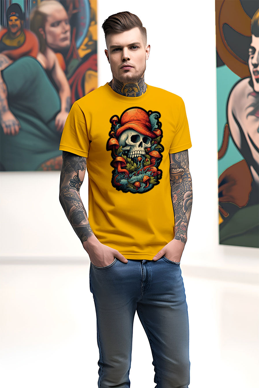 young tattooed man wearing a yellow graphic t-shirt featuring a skull with a hat print
