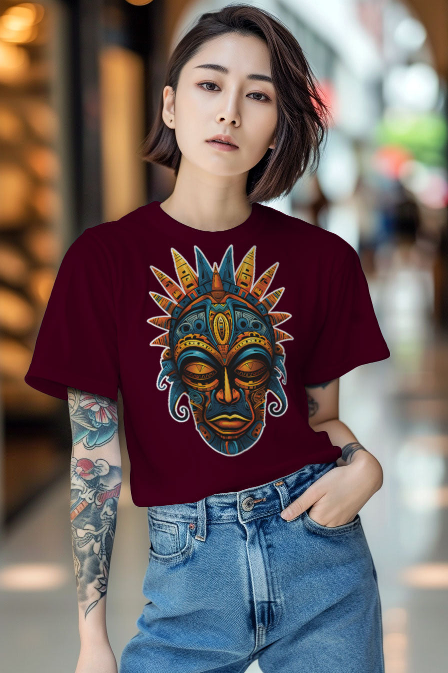 young tattooed woman wearing a Maroon - dark red graphic t-shirt featuring a Aztec mask print