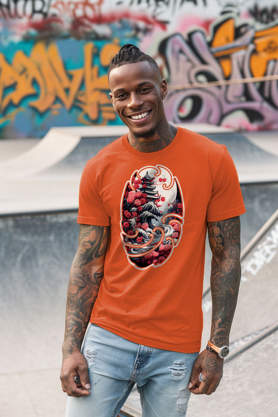 young tattooed man wearing an orange graphic t-shirt featuring a Pagoda print
