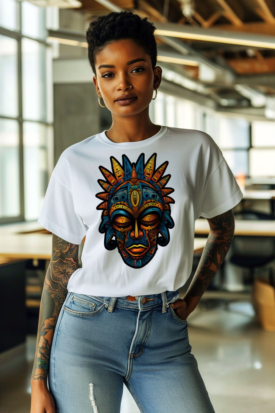 young tattooed woman wearing a white graphic t-shirt featuring a Aztec mask print