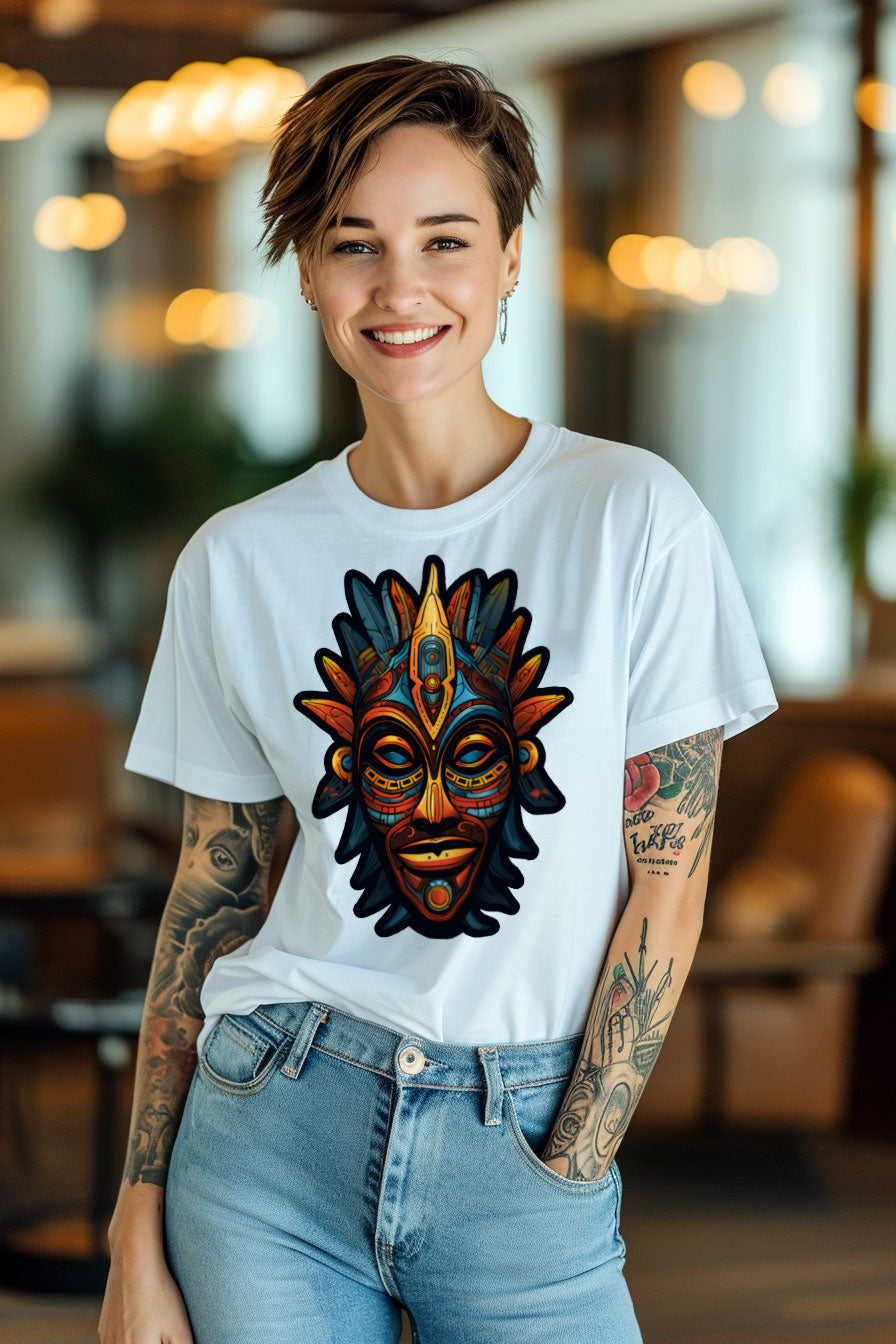 young tattooed woman wearing a white graphic t-shirt featuring a Aztec mask print